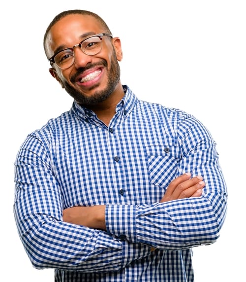 Man wearing glasses and a blue checkered shirt, smiling with arms crossed. White background.