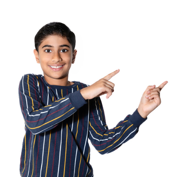 A smiling child in a striped sweater points excitedly to the right against a plain white background.